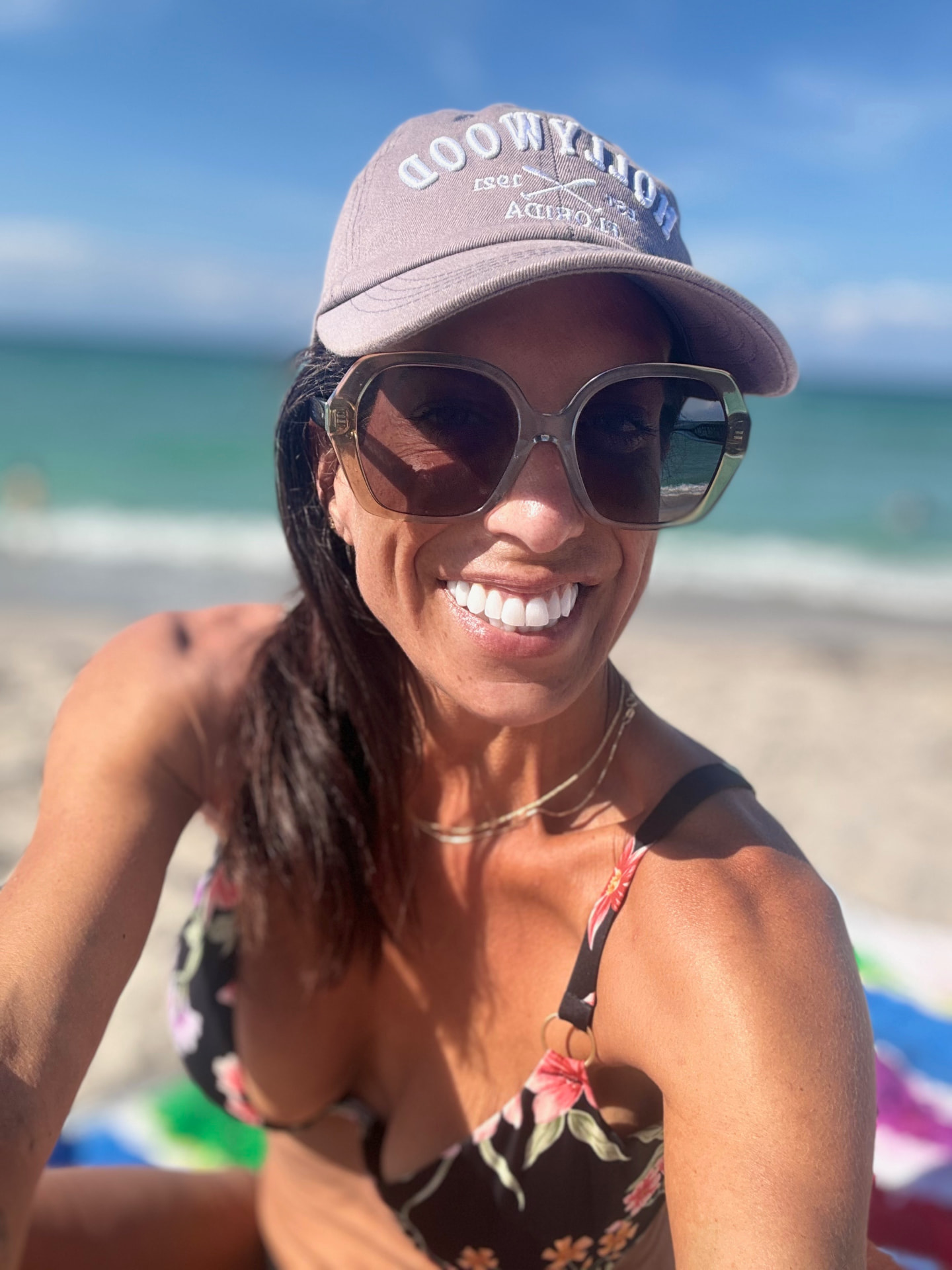 Coach Jay smiling on a sunny Florida beach